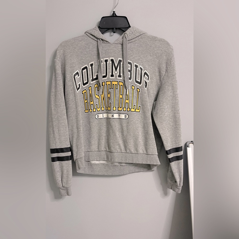 Columbus giants basketball cropped hoodie. A but worn in the A and N in giants.